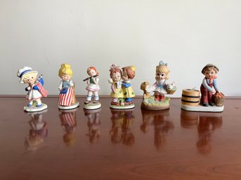 Group Of Painted Porcelain Figurines