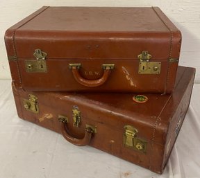Two Vintage Leather Clad Suitcases