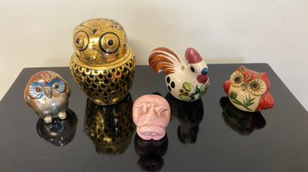 A Group Of Five Decorative Ceramic Figurines