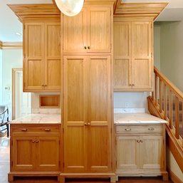 A Custom Oak Mudroom Pantry Cabinet Unit With Marble Counters And More