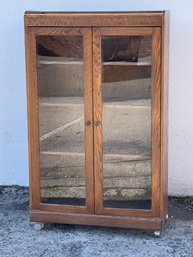 1940s Oak 2- Door Glass Front Cabinet/ Bookcase On Casters