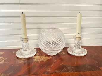 Cut Crystal Candlesticks And A Round Vase