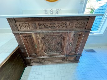 Bath Sink- Molded Corian??? With Custom Made Cabinetry, Carved In Relief Front Panel With Brass Hardware