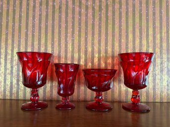 Group Of Four Red Glasses