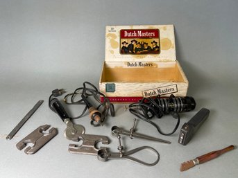 A Variety Of Tools In Cigar Box