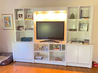 White Formica Storage Display And Tv Console With TV And Remote