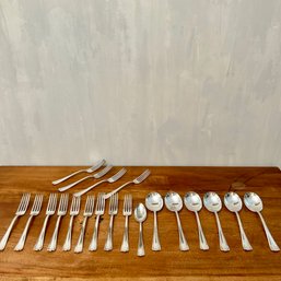 A Collection Of Silver Plate Spoons And Forks