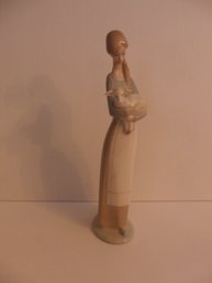 Lladro - Woman Holding Baby Sheep