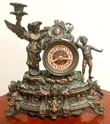 A Vintage Bronze Clock/candlestick Combo