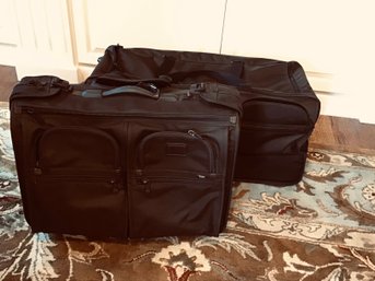 Pair Of TUMI Rolling Luggage Bags