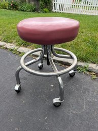 Maroon Top Rolling Stool