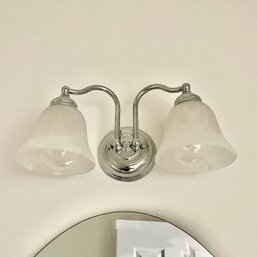 A Double Light Chrome Sconce With Frosted Shades - Powder Room
