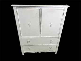An Antique Painted Wardrobe With Dovetail Joinery