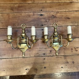 A Pair Of Cast Brass Sconces -