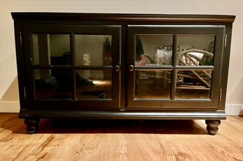 Black Wood TV Cabinet With Glass Doors And Matching Black Mirror