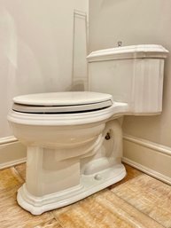 A 1 Piece Kohler Toilet - Powder Room