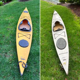 Two Fifteen Foot Merlin Eddyline Kayaks With Wheel Trollies