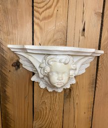 Signed Cherub Head Ceramic Shelf