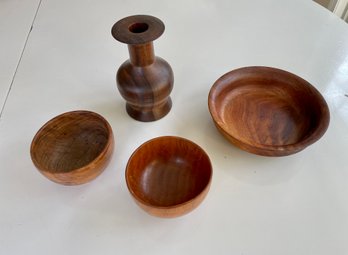 A Group Of Four Mid Century Turned Wood Vessels