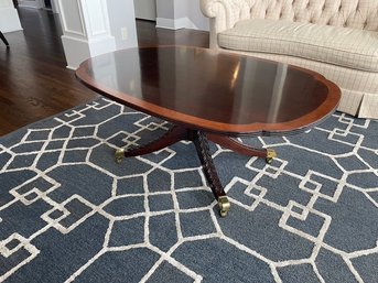 Stickley Mahogany Coffee Table  The Pedestal Has Four Carved Legs With  Brass Feet / Casters