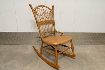 Vintage Rattan Spindle Back Rocking Chair