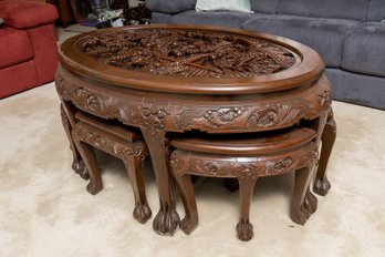 Beautiful Antique Chinese Carved Mahogany Cocktail Table With Glass Top And Six Nesting Stools With Paw Feet
