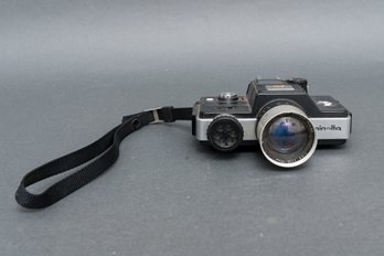 Vintage Minolta 110 Zoom SLR With Rokkor F4.5/25-50mm Lens