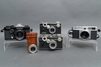 Collection Of Four Vintage Argus Cameras With Lenses