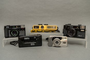 Collection Of Point And Shoot Cameras - Minolta, Olympus, Ricoh, And Nishika