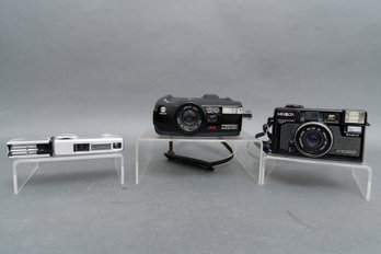 Three Vintage Minolta Cameras