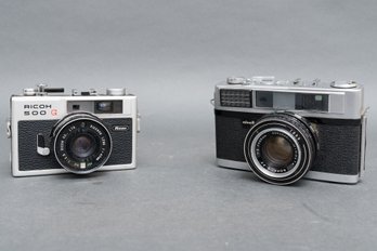 Pair Of Vintage 35MM Cameras - Minolta And Ricoh