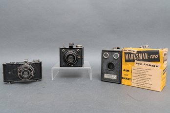 Three Vintage Cameras - Zenith, Brownie, And Falcon