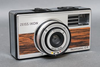 Vintage Zeiss Ikon Ikomatic CF Point And Shoot Camera With Wood Grain Finish And Case
