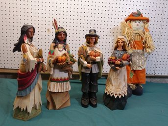 Autumn Decorations Of Indians And Pilgrims And A Scarecrow