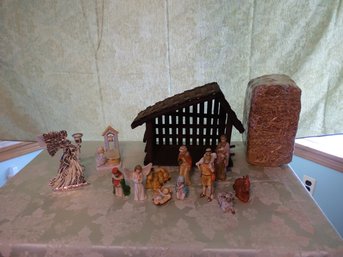 Nativity Scene With 11 Characters And A Manager.