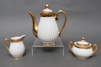 Porcelaine Elegance Teapot, Sugar Bowl, And Creamer