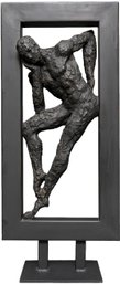 Leaning Man Inside Box Sculpture