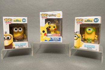 Three Funko Pop! Minions And Pokemon Figurines