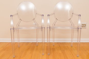 A Pair Of Acrylic Ghost Chairs With Arms