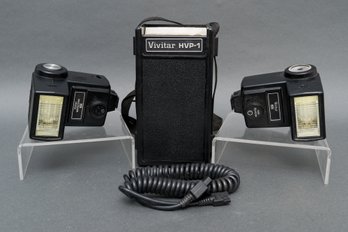 Pair Of Vivitar Auto Thyristor 283 Electronic Flashes And HVP 1 Battery Pack
