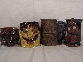 Lot Of Four (4) Pottery Faces Coffee Mugs