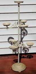 A Victorian Eastlake Styled Wrought Iron Plant Stand With Adjustable Arms