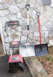 A Toro 1200 Direct Drive 24' Electric Snowblower & Two Shovels