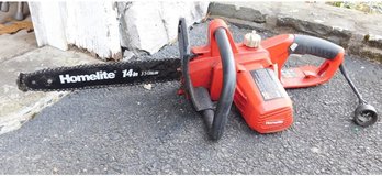 A Homelite 14' Electric Chainsaw