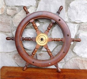 A Teak 6 Spoke Ship's Wheel With Brass Keyway