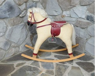 A Child's Corduroy Rocking Horse W/Leather Saddle