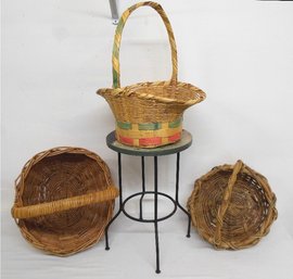 A Grouping Of Baskets And Iron Base Plant Stand