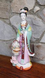 A Large Porcelain Figurine Of A Japanese Princess Or Empress