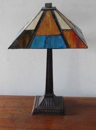 An Arts & Crafts Styled 4 Panel Stained Glass Table Lamp