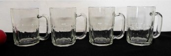 A Set Of 4 Glass Beer Mugs